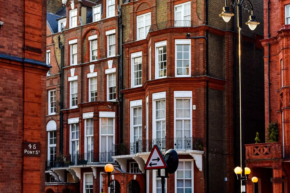 Red brick Victorian terraced houses on a London street